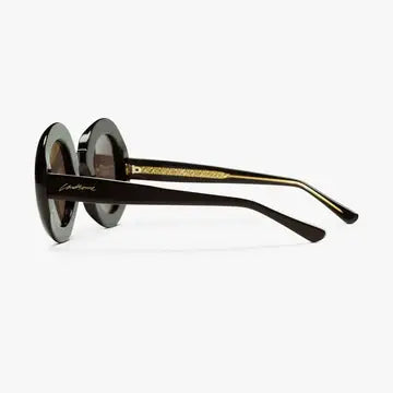 Side view of retro Jackie O style tortoise sunglasses Hunted and Co.