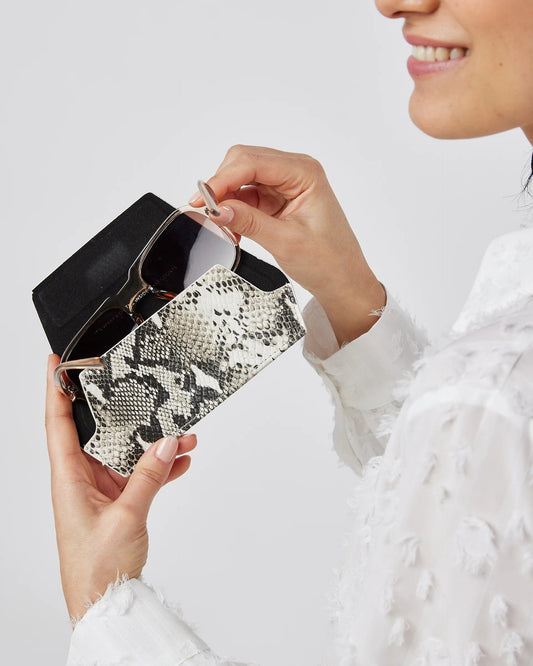 Hunted + Co. snake print leather glasses case with textured leather and snap closure.