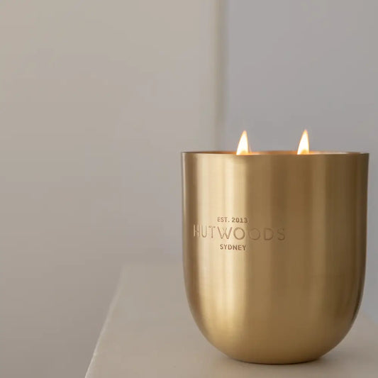 Close-up of wood wick burning in Hutwoods Cedar Leaf & Vanilla Bean Candle