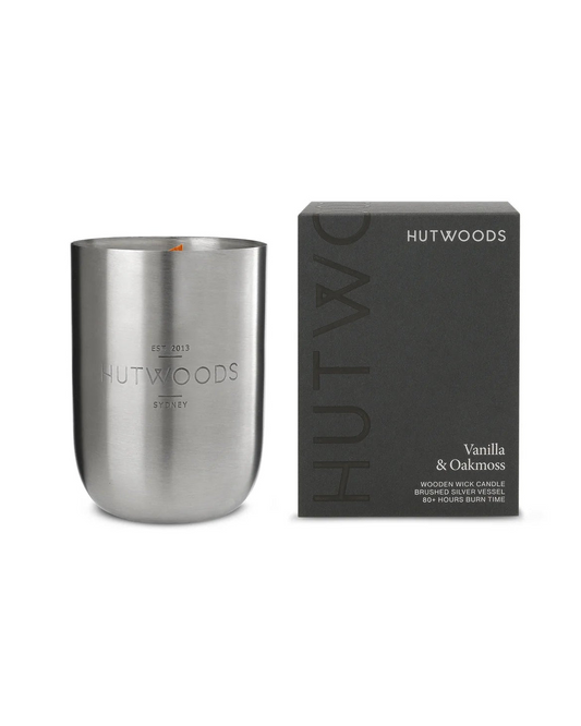 Unlit Hutwoods Vanilla & Oakmoss Candle showcasing sleek packaging