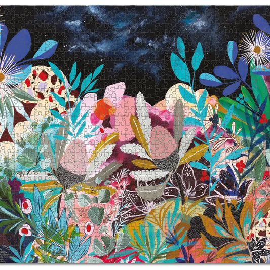 Detail of an assembled Secret Garden jigsaw puzzle depicting lush florals and hidden wildlife.