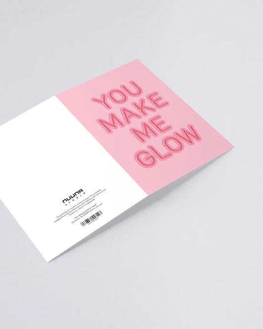 High-quality greeting card by Nuuna reading ‘You Make Me Glow’ - comes with a red envelope.