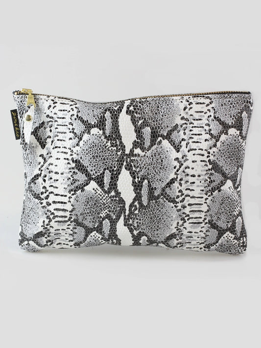 The Monroe Leather Snakeskin pouch on a light background.