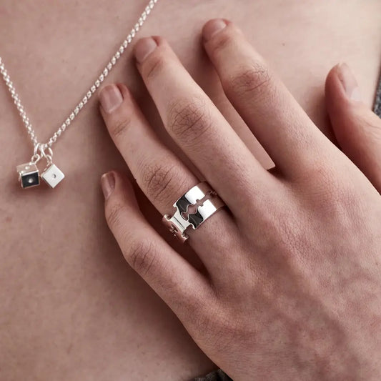 Close up of a model wearing the Stolen Girlfriends Club's Silver Double Blade Ring. So chic!