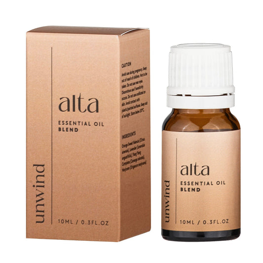 Alta UNWIND essential oil blend bottle and packaging on a white background