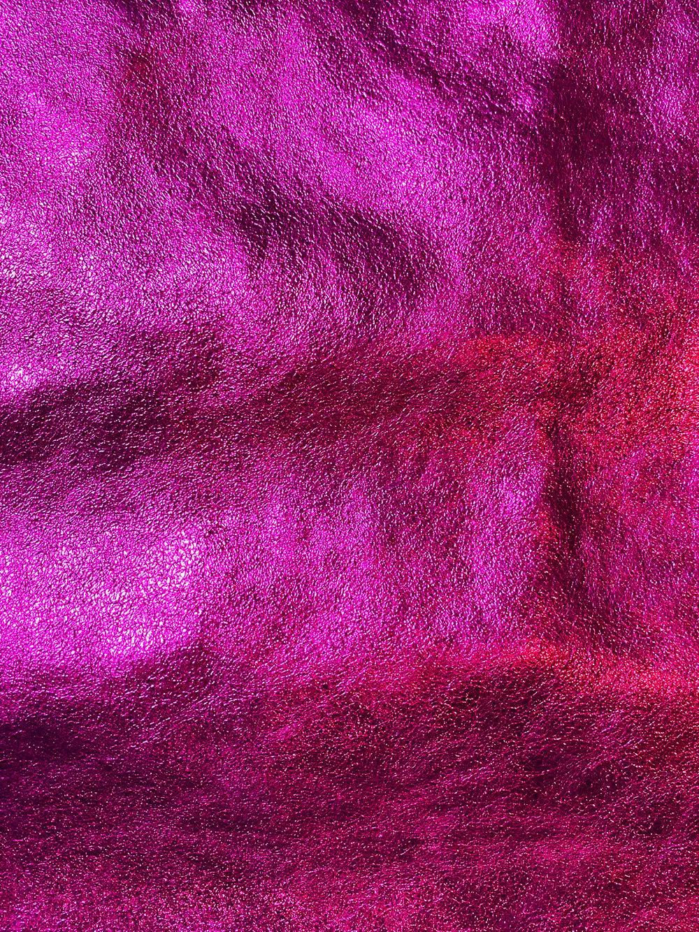 Close-up of shiny metallic leather... it has a beautiful finish for such a delicious and soft leather.