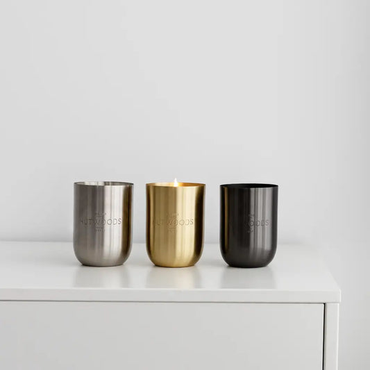 Three of the Hutwood metal container colours: silver, gold and black