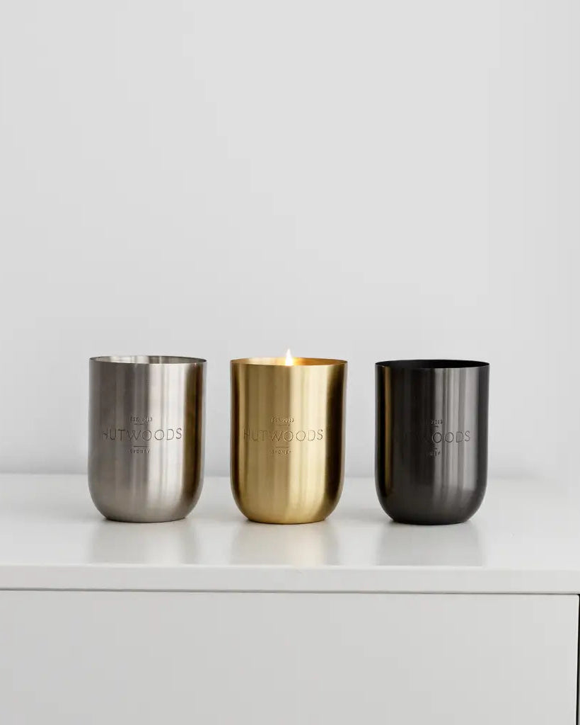 Three of the Hutwood metal container colours: silver, gold and black