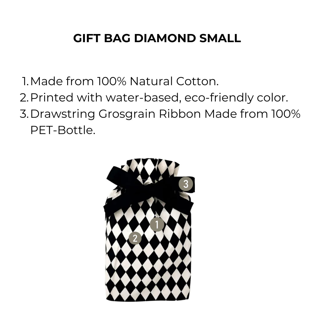 Small handprinted fabric gift bag in black and white diamond pattern with list of features