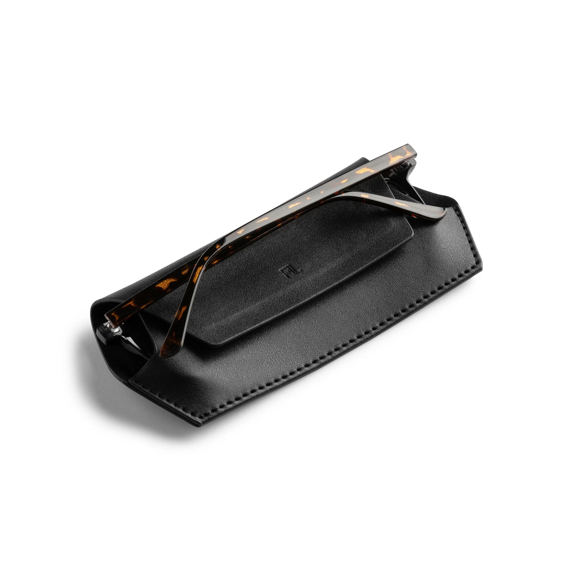 Black glasses case with tortoiseshell accents on a white background