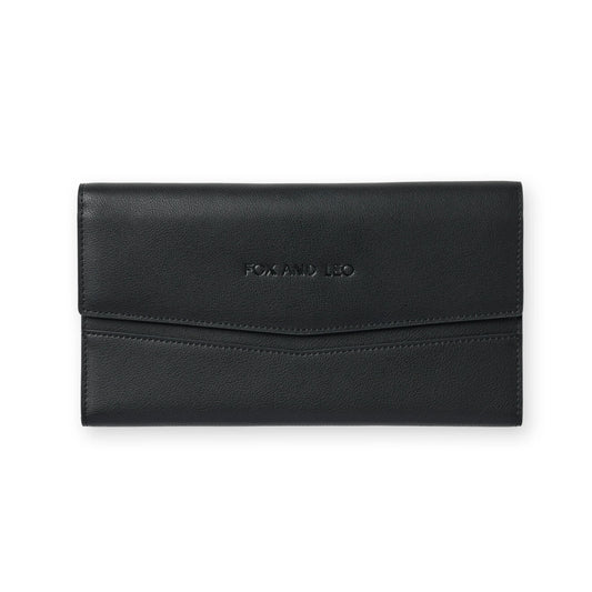 Fox and Leo The Traveller travel wallet in black, front view.