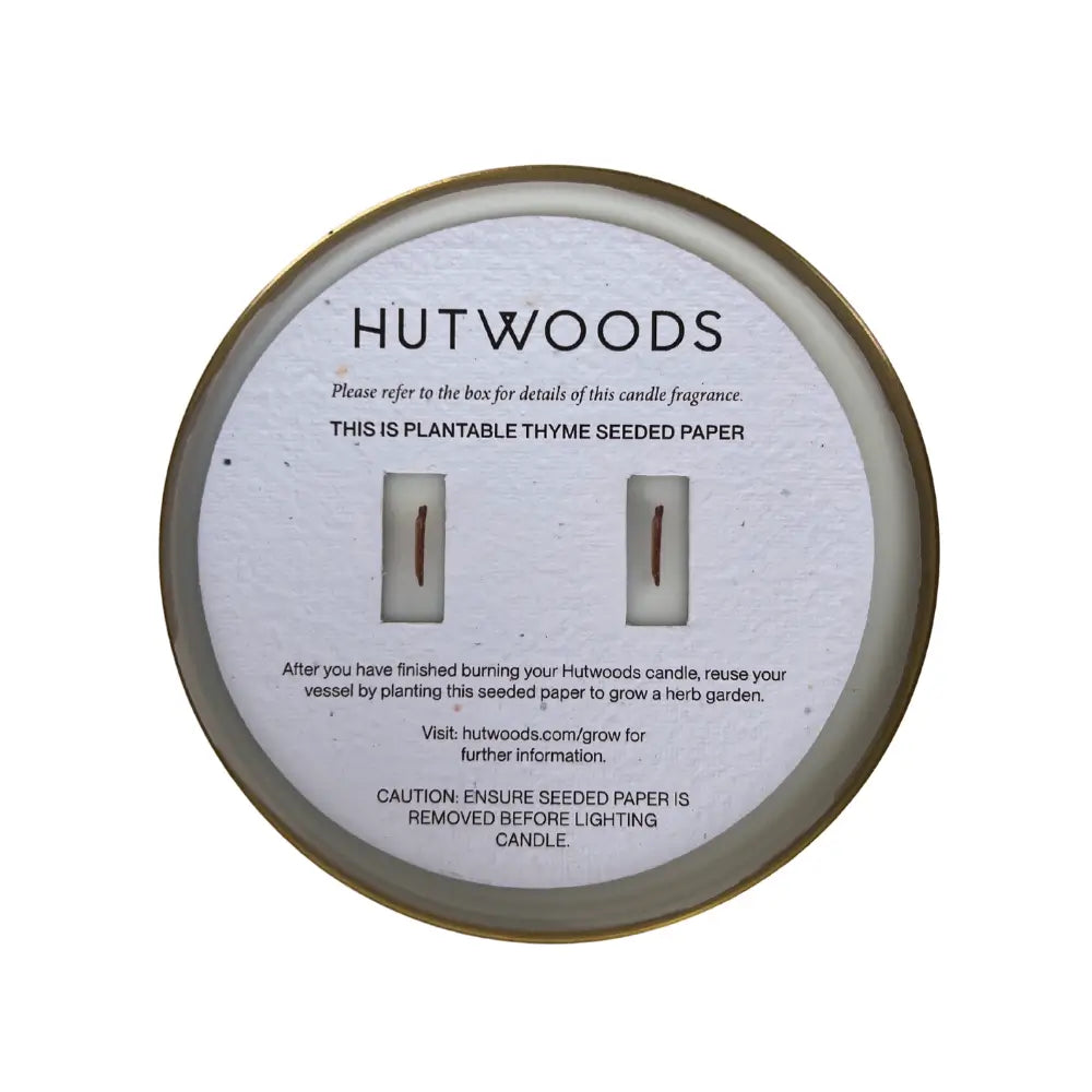 Top view of an XL Hutwood candle with the planted seed paper ready to drop into your garden.