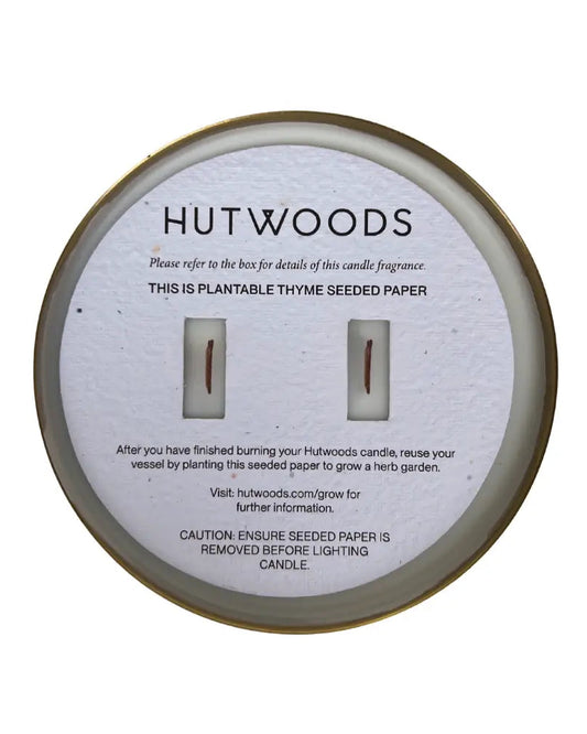Top view of an XL Hutwood candle with the planted seed paper ready to drop into your garden.
