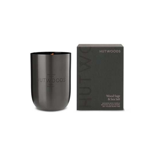Hutwoods Wood Sage & Sea Salt Candle showcasing sleek packaging

