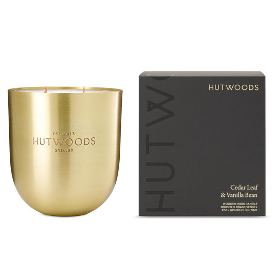 Unlit Hutwoods Cedar Leaf & Vanilla Bean Candle showcasing sleek packaging