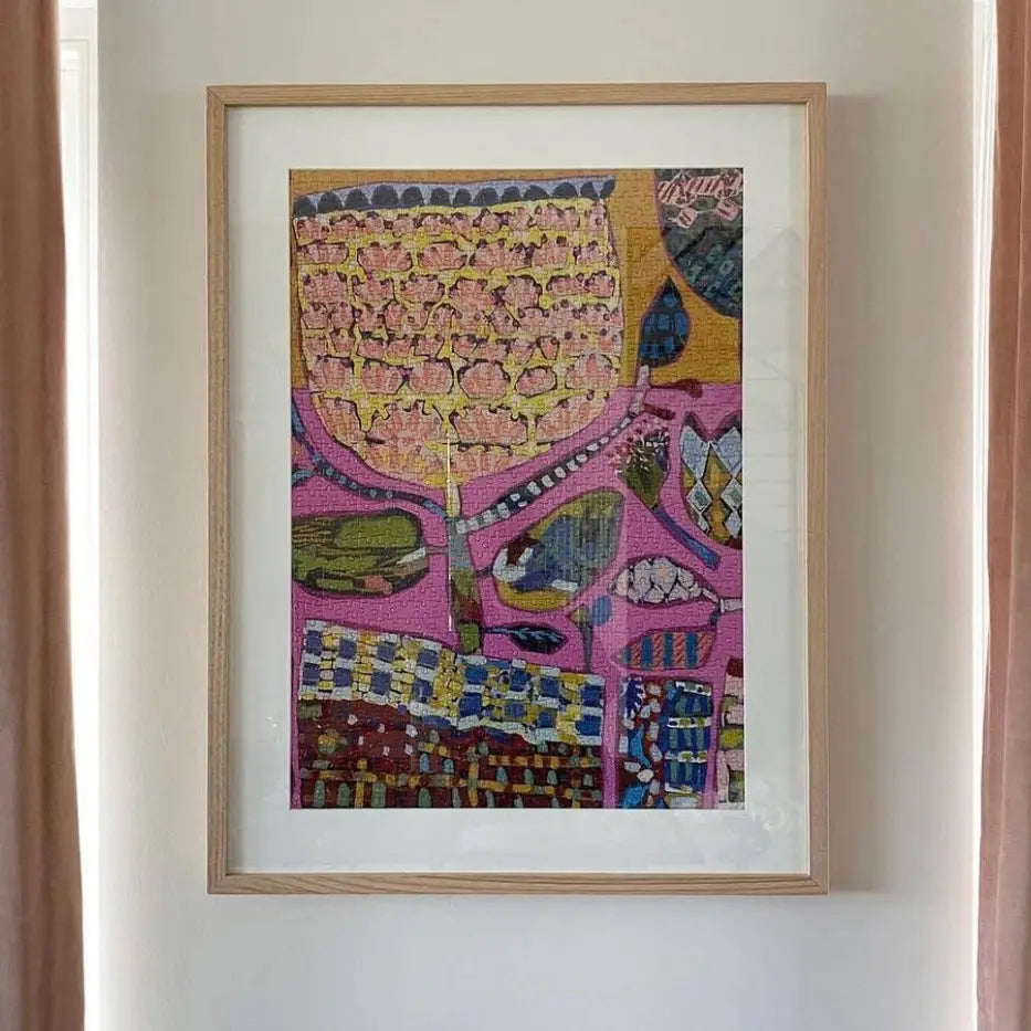 Australian-made Mexicana puzzle—a bold, artistic puzzle designed by Miss Moresby assembled and hanging on a wall. So pretty. 