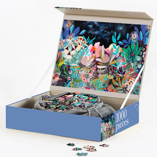 1000-piece Secret Garden puzzle box showing vibrant garden illustration by Georgia Pendlebury.