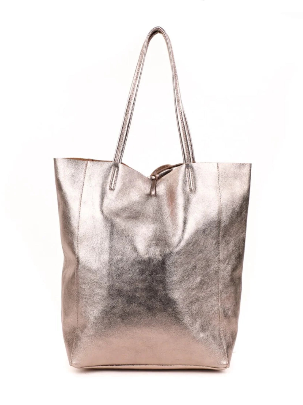 The Maison Fanli - Large Tote Metallic Champagne Gold on a white background. The gorgeous metallic leather looks and feels amazing.