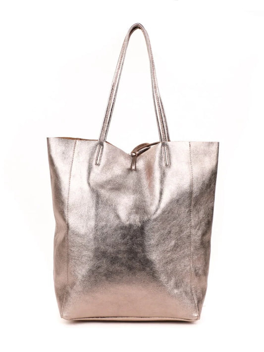 The Maison Fanli - Large Tote Metallic Champagne Gold on a white background. The gorgeous metallic leather looks and feels amazing.