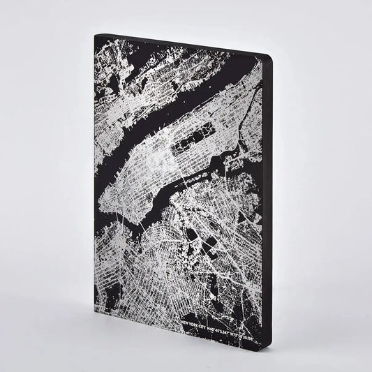 Front cover of the Nuuna NYC Night Flight notebook printed in silver on it's recycled leather cover. 