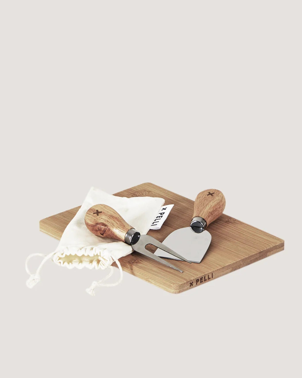 The Pelli 'Feta Together' picnic Cheeseboard + Knife set on a plain background