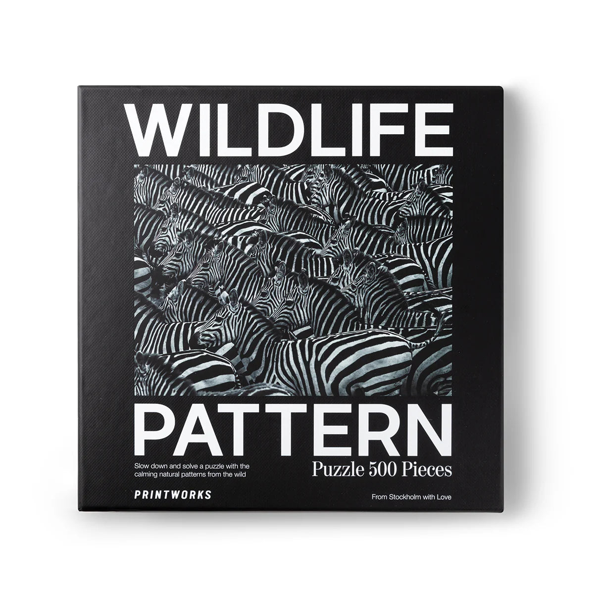 500-piece zebra herd puzzle displaying bold black and white stripes