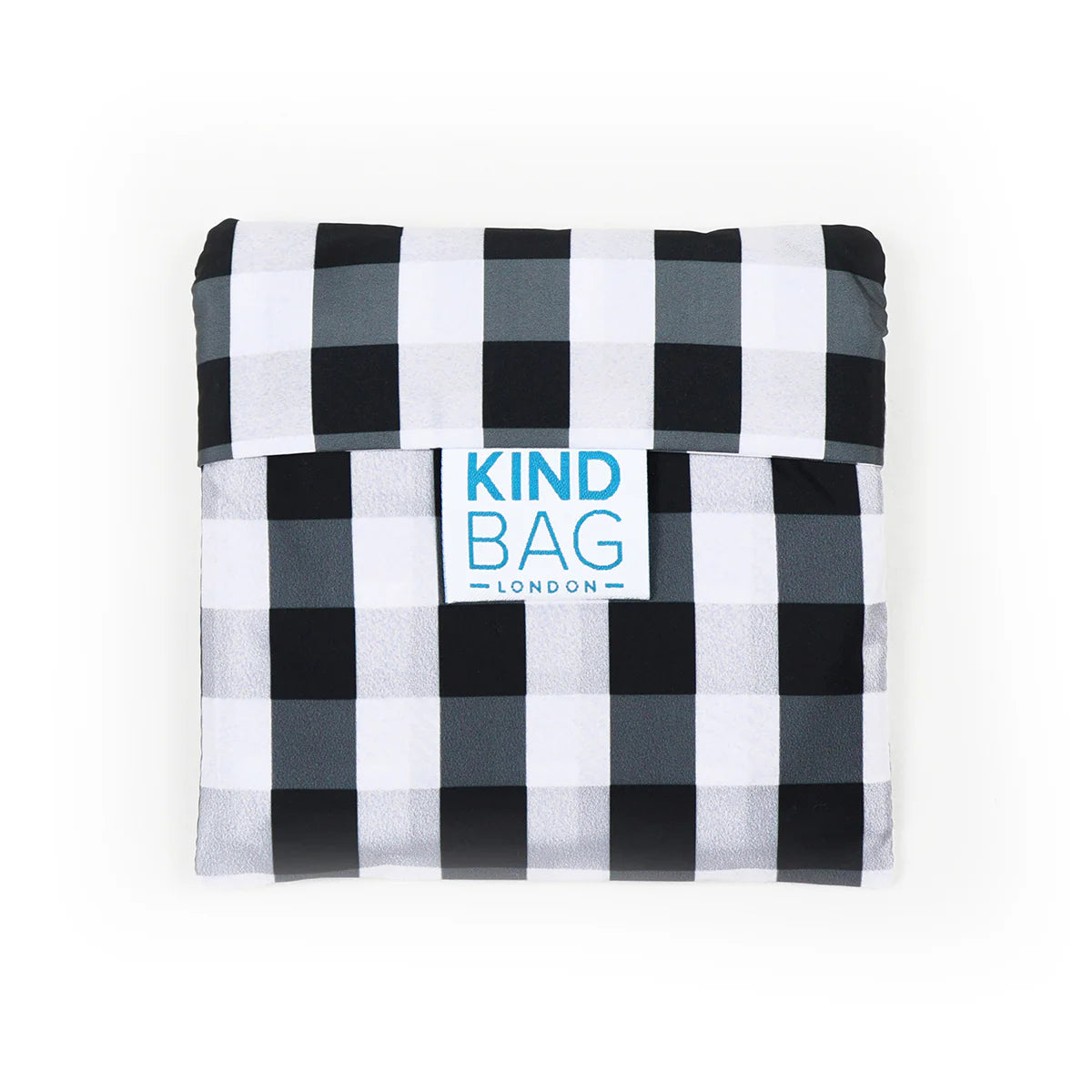 Compact reusable bag folded into attached pouch for easy storage