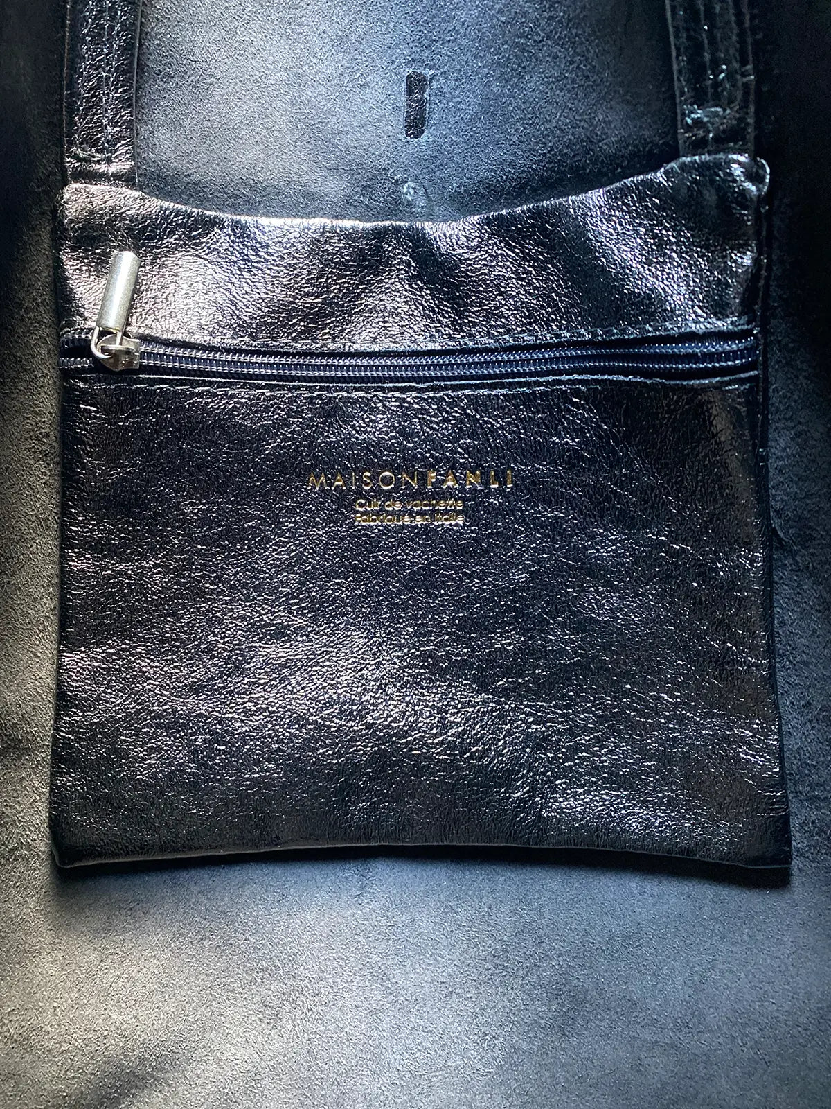 Maison Fanli Large Tote in Metallic Grey internal pocket detail. Keep your small items secure in this attached internal compartment. 