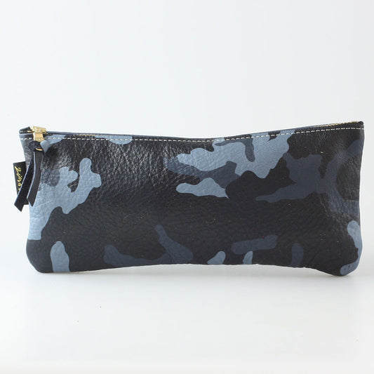 A dark camouflage patterned slim zip pouch with a gold-toned YKK zipper.
