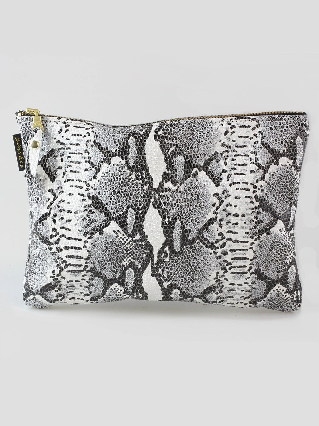 The Monroe Leather Snakeskin pouch on a light background.