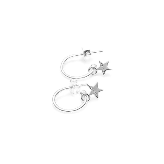 A pair of Stolen Girlfriends Club Stolen Star Anchor Sleeper Earrings in Sterling Silver. Stunning and effortlessly chic dangly earrings.