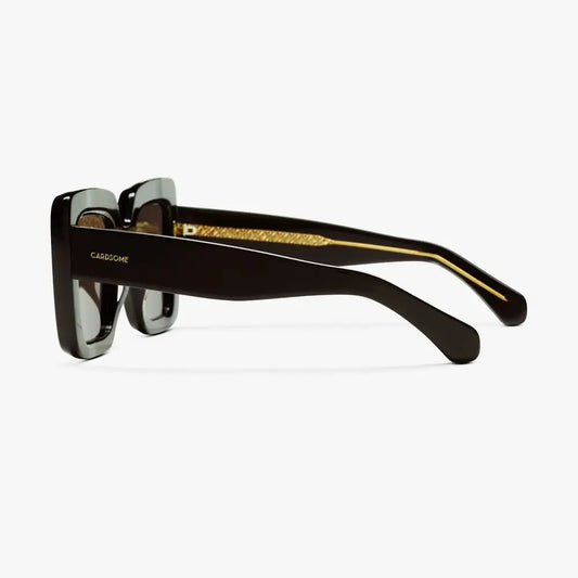 Side view of oversized Brigitte Bardot inspired black sunglasses.