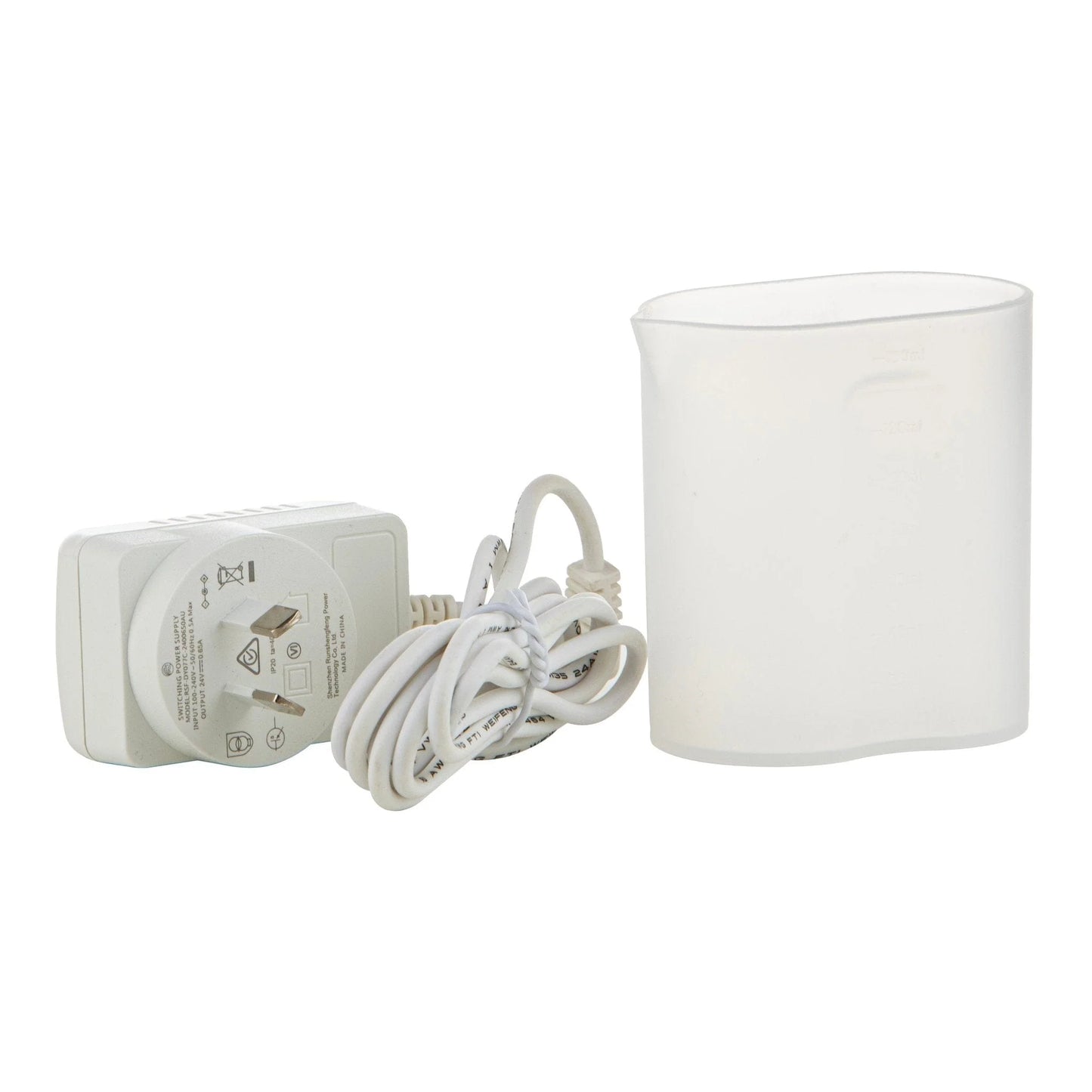 White ceramic ultrasonic diffuser accessories: plug and a jug to fill it up with fresh water.