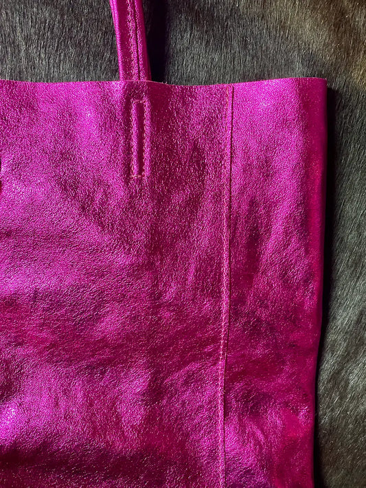 Close-up of Maison Fanli Large Pink Tote bag highlighting the metallic finish, minimal aesthetic and brilliance of the metallic finish.