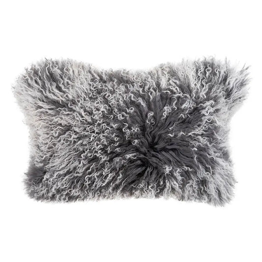 The Hides of Excellence Charcoal and White Mongolian sheepskin lumbar cushion. A gorgeous addition to any char.
