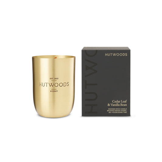 Unlit Hutwoods Cedar Leaf & Vanilla Bean Candle showcasing sleek packaging