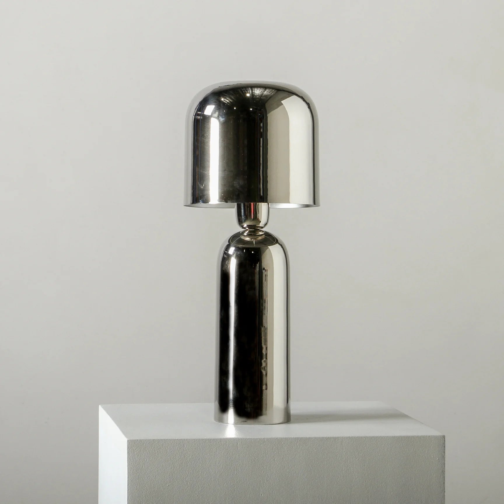 Gifts for the Hard-to-Buy-For: Gorgeous Bolzano Modern Silver Table Lamp on a white plinth 