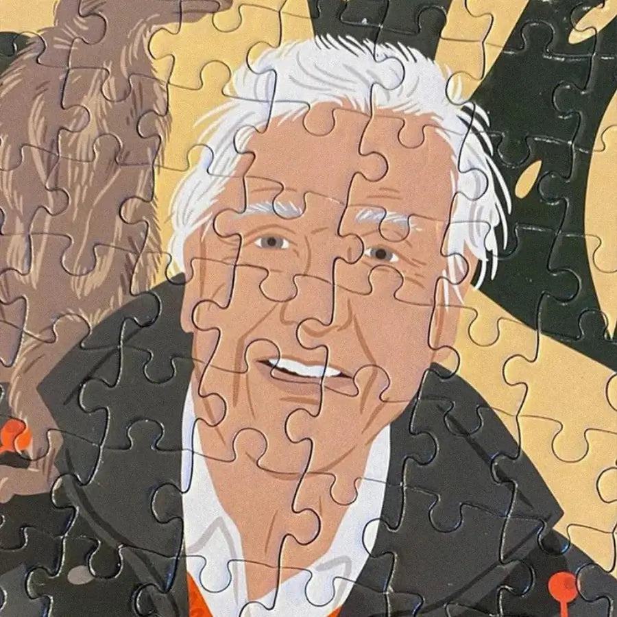 Close up of an assembled Hey Man jigsaw puzzle featuring famous figures in bold art style (70 × 50 cm).