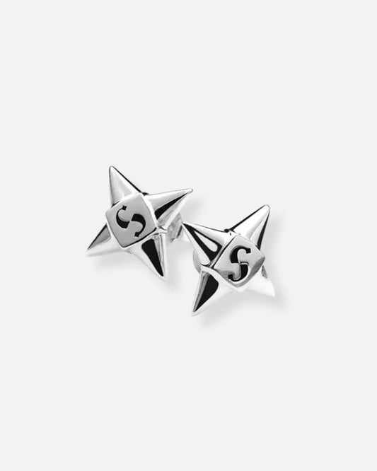 Silver ring with a geometric design on a white background
