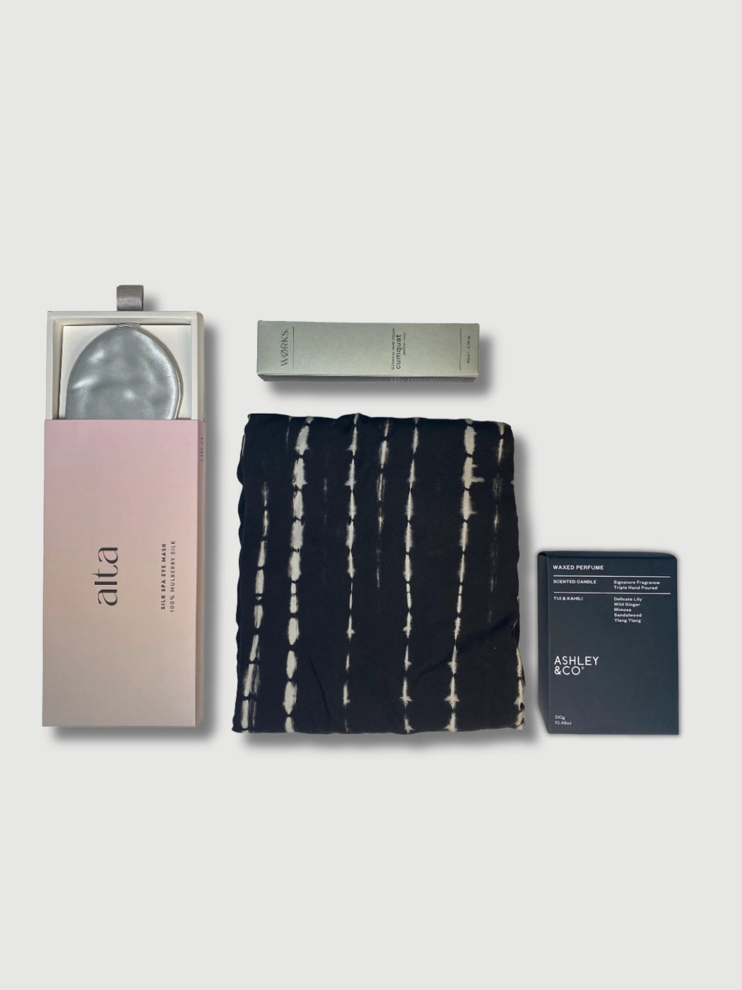 Luxury black and white kimono gift set with robe, candle, hand cream and silk sleep mask in gift box