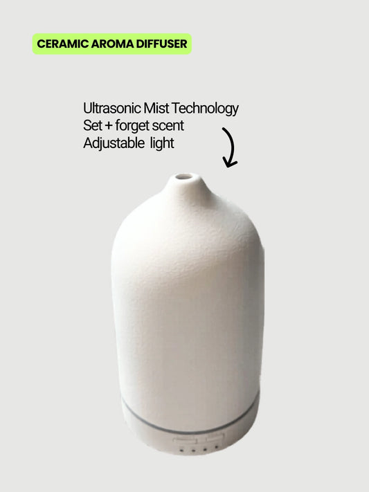 Ceramic aroma diffuser with ultrasonic mist technology and soft ambient light