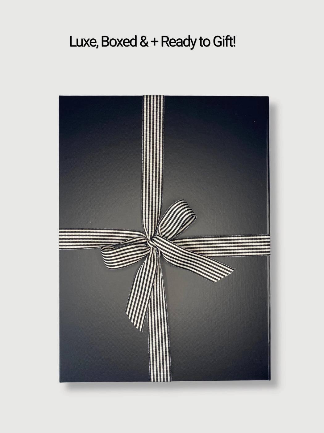 Luxe Wanderer travel gift set in black magnetic gift box with monochrome ribbon ready to gift