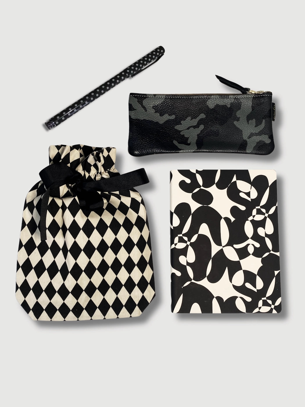 Gifts for the Hard-to-Buy-For: Luxury stationery gift set with Nuuna notebook, cool camo leather pouch, a sweet dotty pen and reusable fabric gift bag